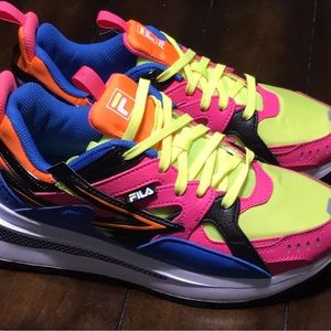 Womens athletic tennis shoes by Fila. These have never been worn outside.